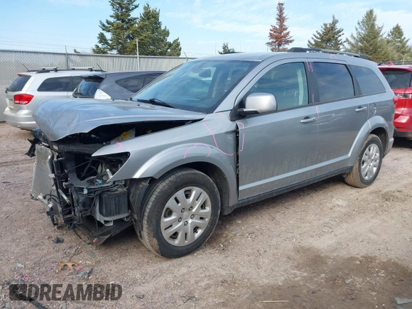 2019 Dodge Journey SE with VIN 3C4PDCBB0KT719211, listed as a IAAI auction lot 41823499 with 151,569 mi miles and . Bid and sale history available at DreamBid. Image 20.