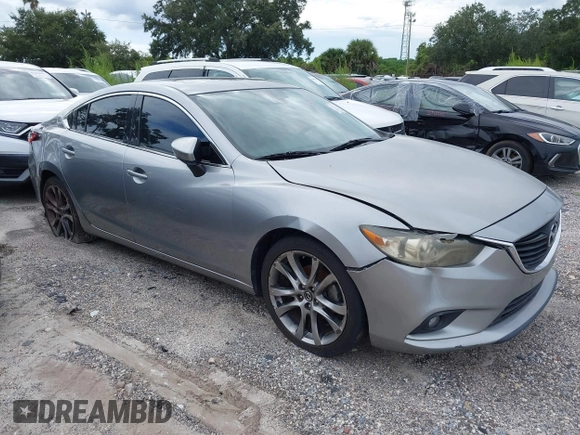 2014 Mazda 6 i Grand Touring с VIN JM1GJ1W6XE1159641, выставлен на аукционе IAAI как лот 39305628 с пробегом 107 853 миль миль и . История ставок и продаж доступна на DreamBid. Изображение 1.