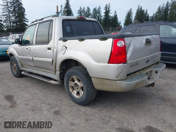 2003 Ford Explorer Sport Trac XLS z VIN 1FMZU77E93UA38468, wystawiony jako IAAI lot #41667956 z przebiegiem 291 806 mil mil oraz . Historia ofert i sprzedaży dostępna na DreamBid. Obrazek 3.