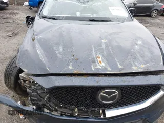 2019 Mazda CX-5 Grand Touring with VIN JM3KFBDM6K0592496, listed as a IAAI auction lot 41730103 with Not Provided miles and . Bid and sale history available at carsss.com. Image 6.