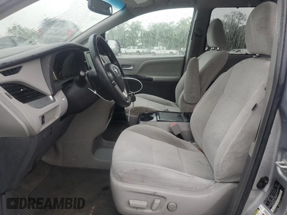 2015 Toyota Sienna LE AAS with VIN 5TDKK3DC5FS550258, listed as a Copart auction lot 58069915 with 138,260 mi miles and Salvage title. Bid and sale history available at DreamBid. Image 7.