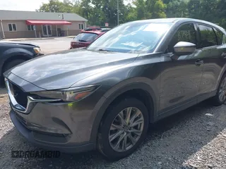2020 Mazda CX-5 Grand Touring with VIN JM3KFBDM1L0821975, listed as a IAAI auction lot 40088794 with 68,895 mi miles and . Bid and sale history available at DreamBid. Image 18.