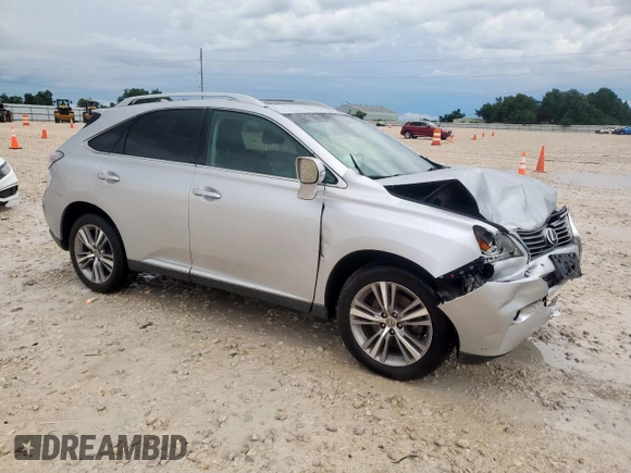 2015 Lexus RX 350 with VIN 2T2BK1BA5FC306653, listed as a Copart auction lot 60835795 with 128,574 mi miles and Salvage title. Bid and sale history available at DreamBid. Image 4.