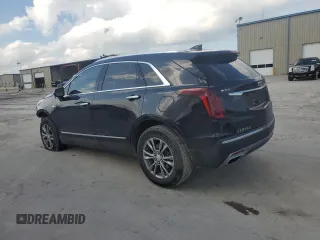 2021 Cadillac XT5 FWD Premium Luxury z VIN 1GYKNCR41MZ174477, wystawiony jako Copart lot #54335615 z przebiegiem 39 158 mil mil oraz Szkody całkowita. Historia ofert i sprzedaży dostępna na DreamBid. Obrazek 2.
