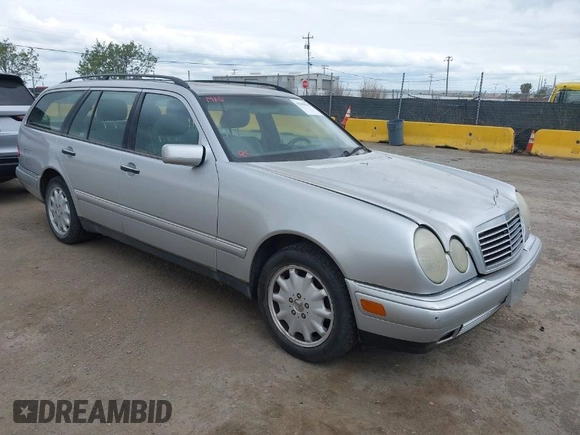 1999 Mercedes-Benz E-Class with VIN WDBJH65F5XA721205, listed as a IAAI auction lot 42068204 with 183,421 mi miles. Bid and sale history available at carsss.com. Image 1.