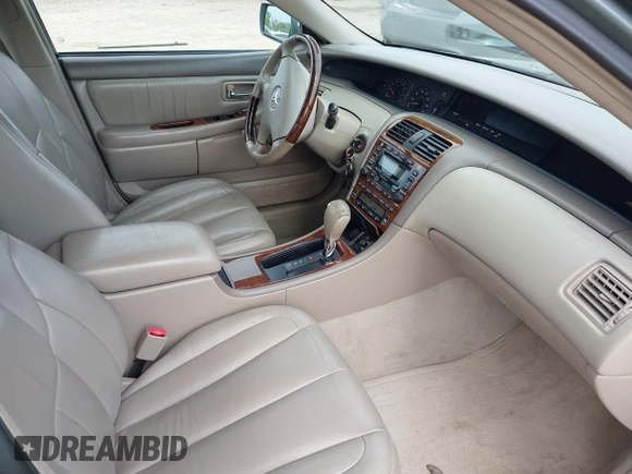 2004 Toyota Avalon XL with VIN 4T1BF28B04U370884, listed as a IAAI auction lot 42207912 with 210,339 mi miles and . Bid and sale history available at DreamBid. Image 5.