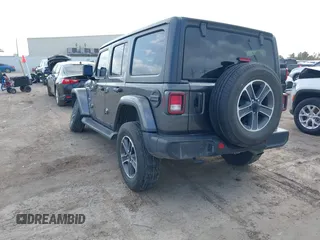 2023 Jeep Wrangler Sahara with VIN 1C4HJXEN6PW639004, listed as a IAAI auction lot 41174113 with 35,371 mi miles. Bid and sale history available at carsss.com. Image 3.