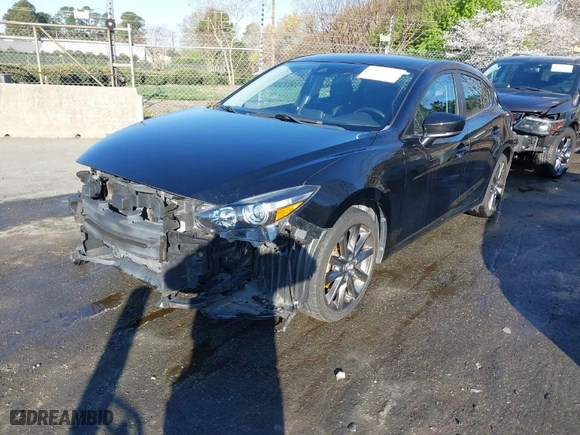 2018 Mazda Mazda3 5-Door Touring with VIN 3MZBN1L31JM200628, listed as a IAAI auction lot 41680209 with 95,656 mi miles. Bid and sale history available at carsss.com. Image 2.