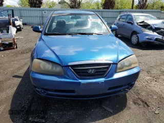 2005 Hyundai Elantra GLS z VIN KMHDN46D15U063723, wystawiony jako Copart lot #56113495 z przebiegiem 115 513 mil mil oraz Szkoda całkowita • Salvage title. Historia ofert i sprzedaży dostępna na DreamBid. Obrazek 5.