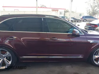 2021 Bentley Bentayga V8 z VIN SJAAM2ZV1MC037602, wystawiony jako IAAI lot #42397866 z przebiegiem Nie podano mil oraz . Historia ofert i sprzedaży dostępna na DreamBid. Obrazek 13.