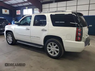 2012 GMC Yukon Denali with VIN 1GKS2EEF4CR147472, listed as a Copart auction lot 73318464 with 133,953 mi miles and Clean Title. Bid and sale history available at carsss.com. Image 2.