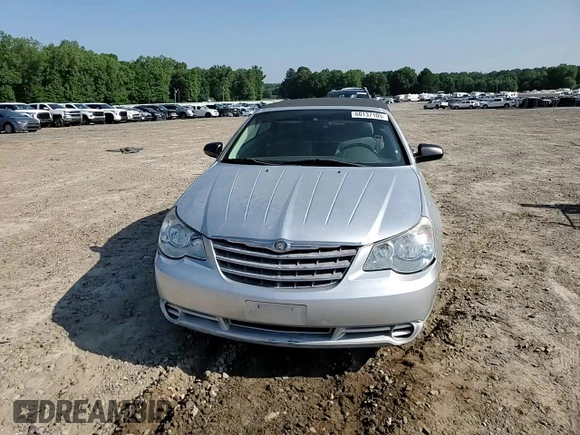 2008 Chrysler Sebring LX z VIN 1C3LC45K28N188707, wystawiony jako Copart lot #60137105 z przebiegiem 245 175 mil mil oraz Szkoda całkowita • Salvage title. Historia ofert i sprzedaży dostępna na DreamBid. Obrazek 13.