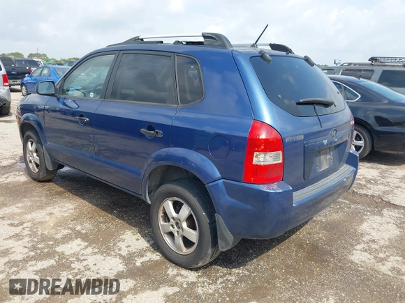 2006 Hyundai Tucson GL with VIN KM8JM12B66U342224, listed as a IAAI auction lot 42079428 with 196,248 mi miles. Bid and sale history available at carsss.com. Image 3.