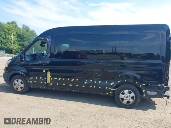 2019 Ford Transit Passenger XL with VIN 1FBAX2CG5KKA77205, listed as a IAAI auction lot 40028485 with 89,924 mi miles and . Bid and sale history available at carsss.com. Image 14.