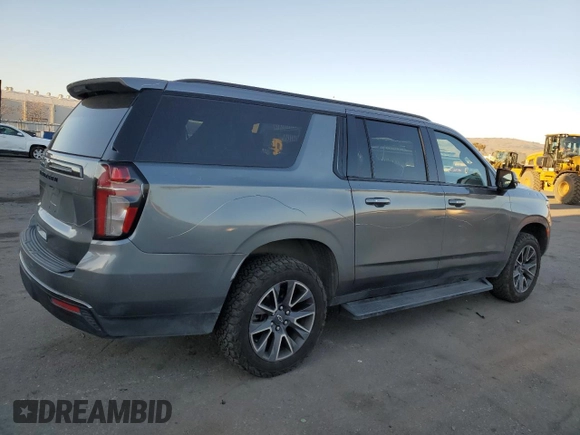 2021 Chevrolet Suburban Z71 with VIN 1GNSKDKDXMR310076, listed as a Copart auction lot 43055185 with 88,300 mi miles and Salvage title. Bid and sale history available at DreamBid. Image 3.