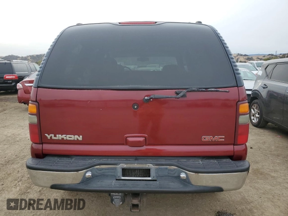 2001 GMC Yukon SLT z VIN 1GKEC13T21J302687, wystawiony jako Copart lot #80982344 z przebiegiem 139 565 mil mil oraz Szkoda całkowita • Salvage title. Historia ofert i sprzedaży dostępna na DreamBid. Obrazek 6.