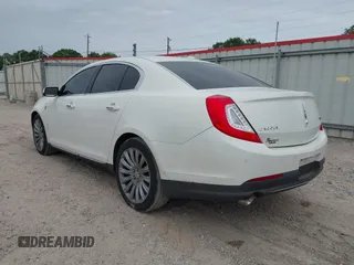 2013 Lincoln MKS with VIN 1LNHL9DKXDG604710, listed as a IAAI auction lot 42001875 with 117,724 mi miles and . Bid and sale history available at DreamBid. Image 3.