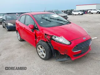 2015 Ford Fiesta SE with VIN 3FADP4BJ9FM129246, listed as a IAAI auction lot 42177812 with 87,925 mi miles. Bid and sale history available at carsss.com. Image 1.