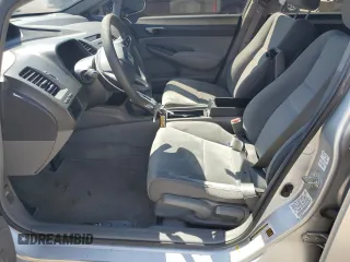 2010 Honda Civic LX with VIN 2HGFA1F51AH306669, listed as a Copart auction lot 50450825 with 143,659 mi miles and Salvage Title. Bid and sale history available at DreamBid. Image 7.