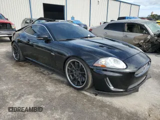 2011 Jaguar XK with VIN SAJWA4DCXBMB39622, listed as a Copart auction lot 79881914 with 61,163 mi miles and Salvage Title. Bid and sale history available at carsss.com. Image 4.