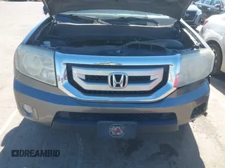 2010 Honda Pilot Touring with VIN 5FNYF4H94AB031167, listed as a IAAI auction lot 41800738 with 184,126 mi miles and . Bid and sale history available at carsss.com. Image 10.