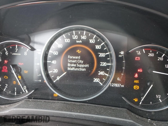 2019 Mazda CX-5 Grand Touring with VIN JM3KFADM6K1581261, listed as a Copart auction lot 59965175 with 127,837 mi miles and Salvage title. Bid and sale history available at DreamBid. Image 9.