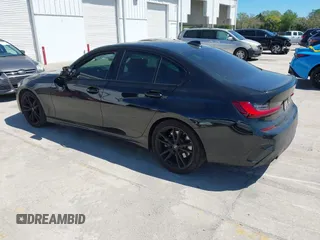 2022 BMW 3 Series 330i with VIN 3MW5R1J08N8C38592, listed as a IAAI auction lot 41832394 with 48,980 mi miles. Bid and sale history available at carsss.com. Image 3.