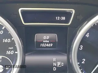 2014 Mercedes-Benz GL-Class GL 550 with VIN 4JGDF7DE2EA313661, listed as a IAAI auction lot 41214931 with 102,469 mi miles. Bid and sale history available at carsss.com. Image 15.