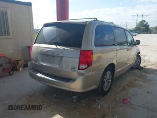 2014 Dodge Grand Caravan SXT with VIN 2C4RDGCG8ER244201, listed as a IAAI auction lot 42017091 with 161,653 mi miles and . Bid and sale history available at DreamBid. Image 4.