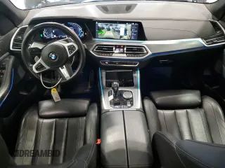2021 BMW X5 xDrive45e with VIN 5UXTA6C02M9F45757, listed as a Copart auction lot 61991985 with 65,162 mi miles and Salvage title. Bid and sale history available at DreamBid. Image 8.