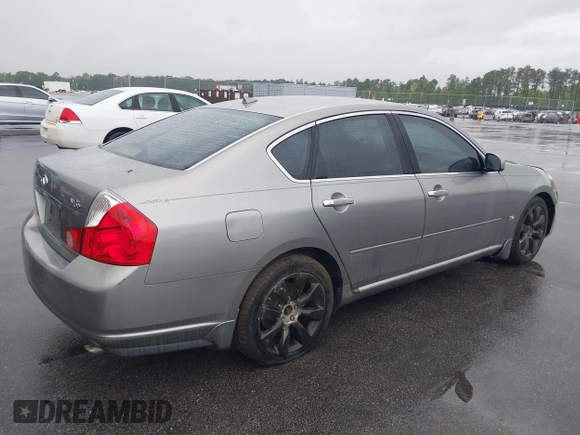 2007 Infiniti M35 Sport with VIN JNKAY01E37M312306, listed as a IAAI auction lot 41959035 with 199,699 mi miles. Bid and sale history available at carsss.com. Image 4.