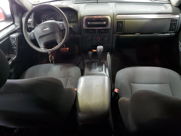 2002 Jeep Grand Cherokee Laredo with VIN 1J4GW48S22C164159, listed as a Copart auction lot 89146265 with 135,087 mi miles and Salvage Title. Bid and sale history available at carsss.com. Image 8.