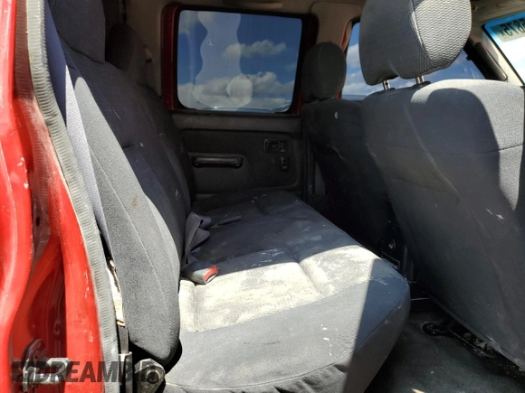2002 Nissan Frontier XE with VIN 1N6ED29Y12C388949, listed as a Copart auction lot 55235875 with 212,944 mi miles and Salvage title. Bid and sale history available at DreamBid. Image 10.