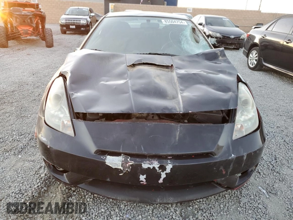 2004 Toyota Celica GT with VIN JTDDR32T040168744, listed as a Copart auction lot 85504754 with 210,919 mi miles and Clean Title. Bid and sale history available at DreamBid. Image 5.