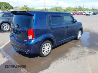 2014 Scion xB with VIN JTLZE4FE6EJ057604, listed as a IAAI auction lot 41528031 with 48,403 mi miles. Bid and sale history available at carsss.com. Image 4.