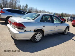2002 Honda Accord LX z VIN 1HGCG56402A160961, wystawiony jako Copart lot #53092205 z przebiegiem 262 152 mil mil oraz Czysty tytuł • Clean title. Historia ofert i sprzedaży dostępna na DreamBid. Obrazek 3.