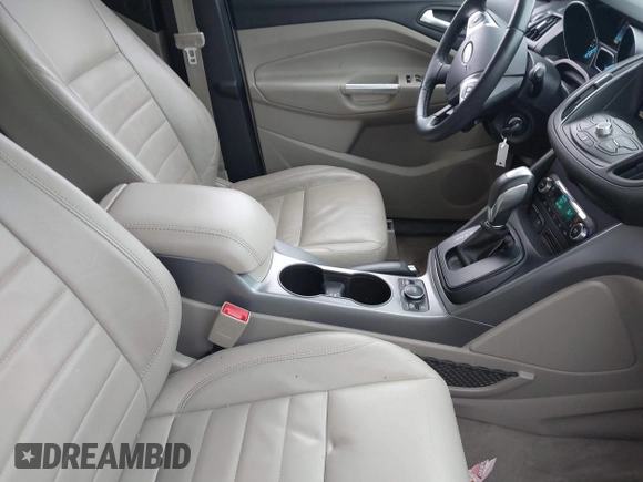 2014 Ford Escape SE with VIN 1FMCU0GX6EUE38280, listed as a IAAI auction lot 41867267 with 152,271 mi miles. Bid and sale history available at carsss.com. Image 5.