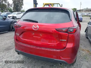 2024 Mazda CX-5 S Carbon Edition z VIN JM3KFBCL3R0530704, wystawiony jako IAAI lot #41958923 z przebiegiem 14 048 mil mil oraz . Historia ofert i sprzedaży dostępna na DreamBid. Obrazek 16.