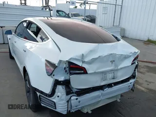 2018 Tesla Model 3 Long Range Battery with VIN 5YJ3E1EA3JF023300, listed as a IAAI auction lot 41925504 with 100,512 mi miles and . Bid and sale history available at DreamBid. Image 6.