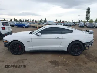 2021 Ford Mustang GT z VIN 1FA6P8CF7M5110160, wystawiony jako IAAI lot #41885188 z przebiegiem 75 799 mil mil oraz . Historia ofert i sprzedaży dostępna na DreamBid. Obrazek 15.