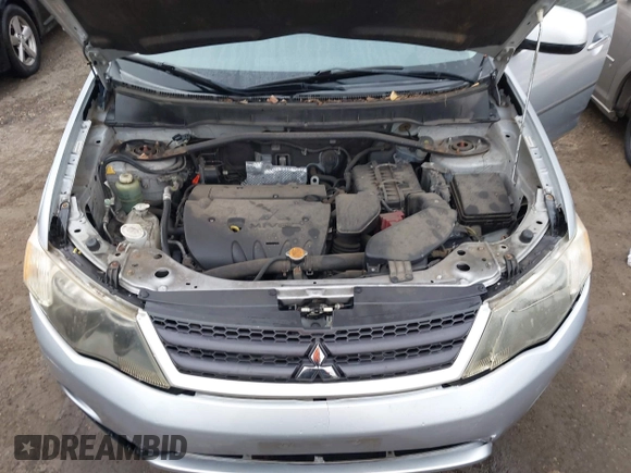 2009 Mitsubishi Outlander SE z VIN JA4MT31W89Z003101, wystawiony jako IAAI lot #41487678 z przebiegiem 90 226 mil mil oraz . Historia ofert i sprzedaży dostępna na DreamBid. Obrazek 10.