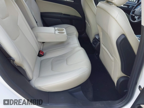 2016 Ford Fusion Titanium with VIN 3FA6P0K96GR400436, listed as a IAAI auction lot 42191256 with 128,447 mi miles and . Bid and sale history available at DreamBid. Image 8.