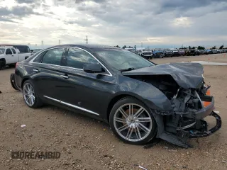2013 Cadillac XTS Luxury z VIN 2G61P5S33D9217027, wystawiony jako Copart lot #56358835 z przebiegiem 82 644 mil mil oraz Szkoda całkowita • Salvage title. Historia ofert i sprzedaży dostępna na DreamBid. Obrazek 4.