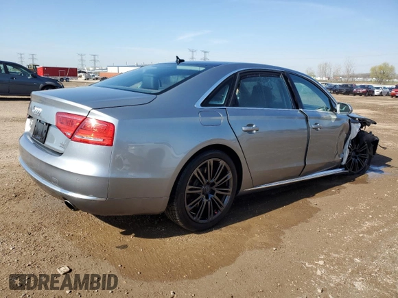 2012 Audi A8 with VIN WAURVAFD8CN018131, listed as a Copart auction lot 54260395 with 98,706 mi miles and Salvage title. Bid and sale history available at DreamBid. Image 3.