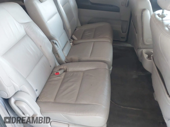 2012 Honda Odyssey EX-L with VIN 5FNRL5H67CB005013, listed as a IAAI auction lot 42295586 with 200,611 mi miles and . Bid and sale history available at DreamBid. Image 8.