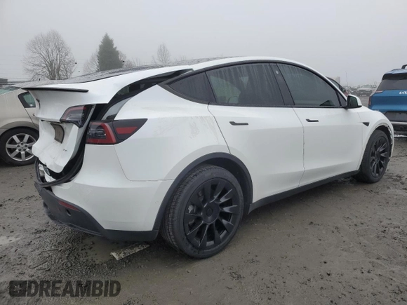 2021 Tesla Model Y Long Range with VIN 5YJYGDEE1MF267004, listed as a Copart auction lot 88708485 with 65,669 mi miles and Salvage Title. Bid and sale history available at DreamBid. Image 3.