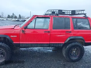 1996 Jeep Cherokee Sport with VIN 1J4FJ68S4TL244893, listed as a IAAI auction lot 41190369 with 192,459 mi miles and . Bid and sale history available at DreamBid. Image 6.