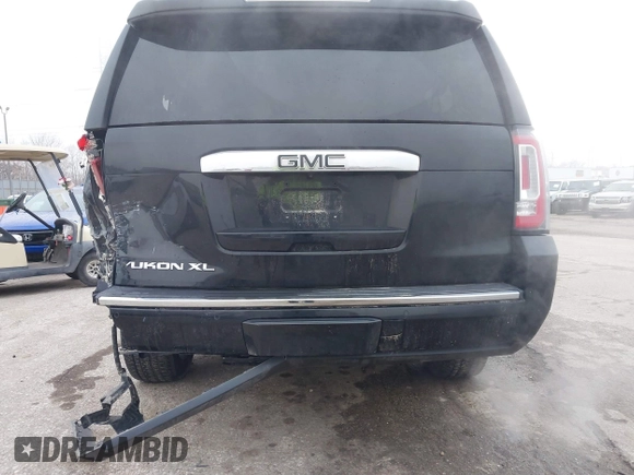 2017 GMC Yukon XL Denali with VIN 1GKS2HKJ2HR310377, listed as a IAAI auction lot 41153582 with 130,194 mi miles. Bid and sale history available at carsss.com. Image 17.