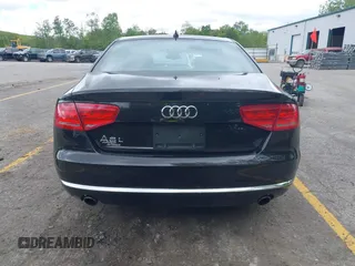 2013 Audi A8 3.0L с VIN WAURGAFD8DN012938, выставлен на аукционе IAAI как лот 42334901 с пробегом 64 235 миль миль и . История ставок и продаж доступна на DreamBid. Изображение 16.