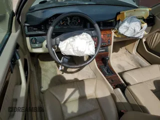 1995 Mercedes-Benz E Class with VIN WDBEA66EXSC176515, listed as a Copart auction lot 71495944 with 141,036 mi miles and Salvage Title. Bid and sale history available at carsss.com. Image 8.